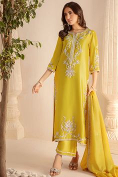 Kiara Bollywood Style Lawn Suit With Cutdana For Festive Occasions, Festive Bollywood Lawn Suit With Cutdana, Elegant Yellow Traditional Wear With Cutdana, Unstitched Chinon Suit With Cutdana For Eid, Elegant Designer Yellow Sharara, Elegant Designer Wear Yellow Sharara, Silk Lawn Suit With Traditional Drape For Festive Occasions, Traditional Drape Silk Lawn Suit For Festive Occasions, Designer Silk Kurta With Mirror Work