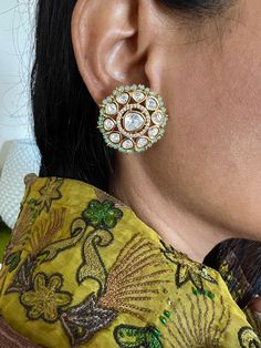 Restocked ♥️ On popular demand  This gorgeous Bridal Studs will add a perfect charm to your festive wear. One of our favorite picks for the wedding season  The diameter of the studs is 3cms. The weight of the studs is 12 grams per pair. Notice the zirconia stones bordering the center Kundan piece. Premium Quality Colour: Mint Green Bridal Earrings With Zari Work For Reception, Festive Gota Work Chandbalis For Reception, Festive Chandbalis With Gota Work For Reception, Bridal Earrings With Zari Work For Diwali Reception, Gota Work Bridal Earrings For Reception And Festivals, Diwali Reception Bridal Earrings With Zari Work, Festive Bridal Earrings With Meenakari For Reception, Kundan Earrings With Zari Work, Round Kundan Earrings With Zari Work