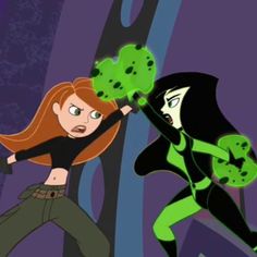 an animated image of two women with green hair and black clothes, one is holding the other