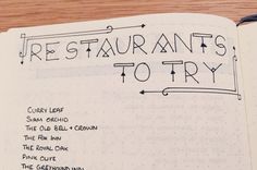 an open notebook with the words restaurant's to try written in cursive writing