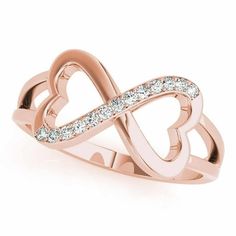 This stunning natural diamond infinity heart ring is crafted of 14K rose gold and is a true showstopper. The infinity symbol and heart shape perfectly symbolize eternal love and devotion. The sparkling natural diamonds add a touch of elegance and glamour. This ring is perfect for a special occasion or as a symbol of your enduring love.Note: Made-to-order (ships in 4 business days). Product SpecificsAll specifications are approximate and may vary for the same model. Weight 3.5g Metal Rose Gold Me Heart Accessories, Diamond Promise Rings, Infinity Heart, Infinity Ring, Rose Gold Metal, Diamond Rings Bands, Silver Shop, Yellow Gold Ring, Diamond Band