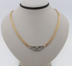 "This is a beautiful vintage 14K yellow gold diamond necklace. The necklace has a gorgeous diamond center. The perfect choice for special occasions. Necklace length: 16 inches. Centerpiece measures 32.3 mm (1.27\") Total diamond weight approx: 1.00 ct The necklace weighs 25.5 g Will be placed into a suitable gift box. Free shipping within the U.S." Hallmarked Diamond Necklace For Evening, Vintage Yellow Gold Diamond Necklace, Timeless Evening Diamond Necklace With 17 Jewels, Vintage Formal Diamond Necklace With Single Cut Diamonds, Classic Evening Diamond Necklace With Single Cut Diamonds, Classic Diamond Necklace With Single Cut Diamonds For Evening, Vintage Yellow Gold Diamond Necklace For Formal Occasions, Vintage Diamond Cut Necklace In Diamond White, Vintage Diamond White Necklace With Diamond Cut