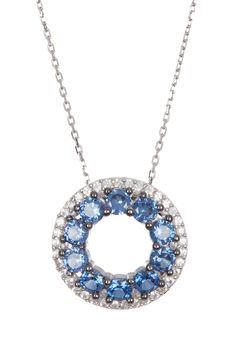 Sterling silver blue sapphire and white sapphire open circle pendant necklace with hidden brown diamond accent. Spring ring clasp. Approx. 17" length. Approx. 5/8" pendant length. ImportedPlease note: Diamond weight may not be exact. Sapphire Necklaces With Halo Setting, Sapphire Jewelry With Pave Setting Gift, Blue Round Jewelry With Pave Setting, Sapphire Round Pendant Jewelry, Sapphire Round Pendant Necklace, Sapphire Cubic Zirconia Jewelry With Pave Setting, Silver Sapphire Jewelry With Pave Setting, Sapphire Cubic Zirconia Round Pendant, Halo Cubic Zirconia Open Circle Jewelry