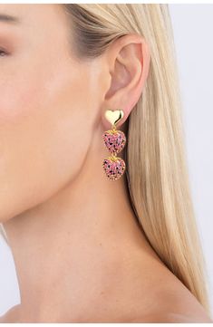 Add a dose of sweetness to your date-night ensemble with these polished earrings with heart-shaped drops. 2" drop Post back 18k-gold plate/cubic zirconia Imported Yellow Gold Heart Earrings For Valentine's Day Party, Valentine's Day Gold Plated Heart Earrings, Valentine's Day Heart Drop Earrings With Cubic Zirconia, Strawberry Heart, Strawberry Hearts, Heart Drop Earrings, Eye Candy, Nordstrom Rack, Date Night