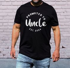 Promoted To Uncle Tshirt, Uncle Est 2024 Shirt, Cute Uncle Shirt, Cool Brother Gift, Best Uncle Ever Tee, New Uncle Shirt,Uncle Birthday Tee, Promoted To Uncle,Uncle Est 2024 Shirt,Cute Uncle Shirt,Cool Brother Gift,Best Uncle Ever Tee,New Uncle Shirt,Uncle Birthday Tee,Funny Family Gifts,Baby Announcement,Fathers Day Gifts,Uncle To Be Gift,Gift for Uncle,Funny Mens Shirt Welcome to my store! I'm absolutely thrilled to have you here. My main aim is to ensure your happiness and satisfaction. I va Anniversary Tops With Funny Text And Short Sleeves, Funny Text Crew Neck Top For Anniversary, Black Cotton T-shirt For Anniversary, Funny Text Crew Neck T-shirt For Anniversary, Anniversary T-shirt With Funny Text, Crew Neck, Casual Name Print T-shirt For Anniversary, Casual T-shirt With Name Print For Anniversary, Father's Day Anniversary Graphic Print Tops, Anniversary Crew Neck Shirt With Graphic Print