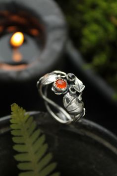 ITEM DESCRIPTION: I can make it any size you want - just mark your size in the order Weight - 3 g.  I made this Halloween ring from 925 silver, carnelian and black spinel. But you can order it with a different stone. This pumpkin ring is amazing! It is about the generous autumn nature and the harvest festival. The ring embodies joy and connection with nature. This handmade ring will come to you in a gift box - ready for gifting. More pumpkin jewelry in my shop: https://www.etsy.com/shop/UrsulaJe Halloween Rings, Ursula Jewelry, Ring Horror, Pumpkin Ring, Pumpkin Jewelry, Forest Necklace, Mushroom Ring, Halloween Ring, Elven Jewelry