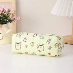 Get organized in style with the Sanrio Color Pop Pencil Case - the perfect blend of spaciousness and cuteness! It features adorable character illustrations on the outside. With one zipper and a convenient pocket, it's easy to carry all your stationery essentials wherever you go. It is crafted from easy-to-maintain material. Choose from our selection of six beloved Sanrio characters to add a touch of personality to your daily routine. Size: 19 cm x 5 cm x 6 cm Material: canvas Brand: Sanrio Cute Portable Pencil Case, Cute Back To School Cosmetic Bag With Pen Slots, Cute Back To School Cosmetic Bag With Pen Holders, Cute Pencil Case With Cute Design For School, Cute School Pouch With Pen Holders, Cute Pencil Case For Back To School, Cute Stationery For Back To School Storage, Cute Rectangular Portable Pencil Case, Cute Pencil Case With Pen Slots For Study