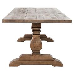 an old wooden table with two pedestals on each side and one leg raised up