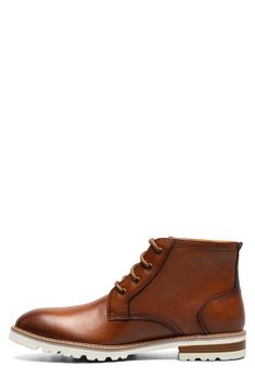 A stitched welt and sturdy lugs lend rugged appeal to a smooth leather lace-up boot with a padded collar and cushioned insole built for comfort. Lace-up style Removable, cushioned insole Leather upper/textile lining/rubber sole Imported Brown Leather Martin Boots With Plain Toe, Brown Moc Toe Lace-up Boots With Leather Footbed, Rugged Lace-up Martin Boots With Goodyear Welt Construction, Brown Business Martin Boots With Plain Toe, Classic Brown Martin Boots For Business, Classic Moc Toe Martin Boots For Fall, Classic Leather Lace-up Martin Boots, Classic Lace-up Leather Martin Boots, Brown Leather Lace-up Boots With Goodyear Welt