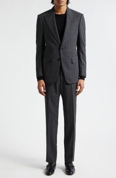 Slim pinstripes mark this impeccably tailored wool two-piece suit featuring flat-front trousers and a two-button cutaway jacket 
Jacket has notched lapels; five-button cuffs; chest welt pocket; front flap pockets; ticket pocket Trousers have zip fly with hook-and-bar closure; adjustable waist tabs; front slant pockets; back button-welt pockets Partially lined 100% wool Dry clean Made in Italy Designer Clothing Pinstripe Notch Lapel Suit For Business Casual, Pinstripe Suit With Notch Lapel For Business Casual, Pinstripe Wool Suit For Office, Pinstripe Notch Lapel Suits For Business, Pinstripe Wool Suits For Formal Occasions, Tailored Pinstripe Suits For Business, Pinstripe Suit With Suit Collar For Business, Pinstripe Suits With Welt Pockets For Business, Striped Suit And Tie Accessories For Work