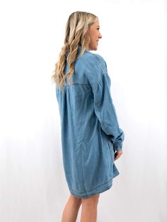 Introducing our Denim Long Sleeve Dress—a versatile and comfortable wardrobe essential. This dress features a classic collared neckline and buttons on the front, adding a touch of timeless style. The soft denim fabric ensures a cozy feel, while the round hemline and practical pockets enhance the overall casual-chic look. Effortlessly blending comfort with a touch of sophistication, this long sleeve denim dress is perfect for various occasions. Embrace easy elegance and practicality in a single g Long Sleeve Denim Dress, Summer Concert, Mini Shirt Dress, Outerwear Sweater, Denim Fabric, Summer Tops, Jeans Dress, Timeless Style, Wardrobe Essentials