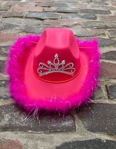 THIS IS A CHILDREN'S HAT! ADULT HATS AVAILABLE IN SHOP> Fits most children Ages 3-10 years old, Looking for an adorable gift for your little cowgirl? This Adorable cowgirl hat is any princesses dream. Perfect for birthdays, dressing up, or heading to the rodeo! We attached a sparkly feathered boa around the brim to add some sassy flair. The princess tiara is perfect for any little girl! One size fits most children. Size: fits most kids from 3+ year old to pre-teen. The circumference (inside) Adjustable Themed Costume Accessories For Birthday, Fun Party Mini Hat With Curved Brim, Fun Brimmed Costume Hats For Parties, Fun Costume Hats With Curved Brim For Parties, Fun Wide Brim Party Costume Hats And Headpieces, Fun Wide Brim Costume Hats And Headpieces For Party, Fun Party Costume Hat With Curved Brim, Novelty Hats For Carnival Costume, Novelty Party Hats With Short Brim