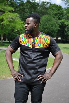 Men's black Polish cotton and Kente shirt with the stylish fit and good for multiple occasions made to be comfortable. FEATURES Short Sleeves Black polish cotton Regular size Dashiki print details Can be ordered in different size and colors INSTRUCTIONS Wash at 30 degrees. Wash similar colors Hand washes for the first wash. Black Short Sleeve Cotton Shirt, Black Cotton Short Sleeve Shirt, Black Cotton Printed Short Sleeve Shirt, Black Cotton Short Sleeve Casual Shirt, Casual Black Crew Neck Short Sleeve Shirt, Black Cotton Crew Neck Short Sleeve Shirt, Fitted Black Short Sleeve Shirt With Graphic Print, Dashiki Dress, Black Polish