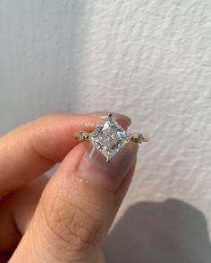 NYK Jewelry 2.75 Carat Princess Cut Moissanite Engagement Ring, Handcrafted Moissanite Ring For Women Surprise Gift, 14K Yellow Gold Promise Ring  ✦  CENTER  STONE  DETAIL ✦ ✧   Stone : Moissanite Diamond ✧   Stone Shape : Princess ✧   Stone Size : 8 mm ✧   Stone Weight : 2.75 Carat Approx ✧   Stone Color : D ( Color Less) ✧   Clarity : VVS ✧   Luster : Excellent ✦ SIDE STONE DETAIL ✦ ✧ Stone : Moissanite Diamond ✧ Stone Shape : Round ✧ Stone Color : D ( Color Less ) ✧ Clarity : VVS ✧ Luster : Excellent ✧  Make : High-Quality Craftsmanship  [Other option available on request] ★ Procedure information Please select the material and ring size from the drop-down menu on the right side of the listing. Each ring is handmade just for you in your size and metal. If you have any special requests or Gold Promise Ring, Princess Cut Moissanite, Gold Promise Rings, Surprise Gift, Gemstone Engagement Rings, Moissanite Ring, Moissanite Rings, Moissanite Diamonds, Ring For Women