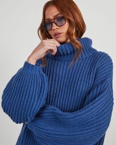 Blue % Milligan Oversized Turtleneck Sweater-3 Trendy Oversized Knit Turtleneck, Winter Relaxed Fit Funnel Neck Sweater, Trendy Oversized Soft Knit Turtleneck, Oversized Blue Sweater For Fall, Oversized High Neck Cable Knit Sweater, Blue High Neck Sweater For Fall, Casual Oversized Soft Knit Turtleneck, Oversized Soft Knit Casual Turtleneck, Oversized Blue Sweater For Cold Weather