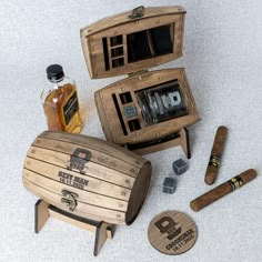 an assortment of wooden items including cigars and bottles