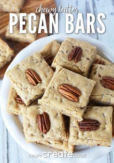 pecan bars stacked on top of each other in a white bowl