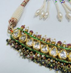 "Vintage antique solid 22 carat Gold 'Katsari' Necklace from 'Mewar state' Udaipur Rajasthan India. Great Handmade Workmanship all over the piece. Beautiful design & seted Rose cut real Diamonds in it. Very nice Red,green & blue color Enamel work at back side of necklace. Attached Ruby, emerald, sapphire & pearl beads in all the Bottom loops. Nice adjustable cord at the back side. Beautiful workmanship Necklace in Good condition,Great for your jewelry collection. Weight-75 Grams (2.6 Traditional Necklace With Gota Work For Festivals, Traditional Necklaces With Gota Work For Festive Occasions, Traditional Kundan Necklace With Gota Work For Festivals, Traditional Festive Necklace With Gota Work, Festive Traditional Necklace With Gota Work, Festive Gota Work Temple Necklace, Traditional Temple Necklace With Gota Work For Festive Occasion, Traditional Temple Necklace With Gota Work For Diwali, Traditional Gota Work Temple Necklace For Diwali