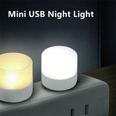 an image of two lights that are on the wall in the dark room with text overlay reading mini usb night light