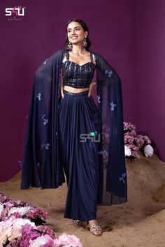 !! Designer Bollywood Collection!! Stylish navy blue Lehenga sari with choli and net jacket. Perfect outfit for Indian weddings or festivals. It is very comfortable and light weight yet stylish and elegant. Details: Blouse Fabric: Georgette Inner : Cotton lined Colour: Blue Sleeves: Sleeveless Embroidery : Cutdana, thread and sequins hand embroidery Lehenga/Skirt Fabric: Crepe Silk Inner : Cotton lined Colour : Blue Design: Ready to wear Lehenga skirt with pre plated saree style. Cape/Jacket  Fa Designer Pre-draped Saree With Cape Sleeves For Eid, Wedding Pre-draped Saree For Eid With Cape Sleeves, Evening Cape Sets Made Of Georgette, Evening Palazzo Set With Sheer Dupatta And Traditional Drape, Evening Palazzo Set With Cape Sleeves, Designer Anarkali Set With Sheer Dupatta And Cape Sleeves, Anarkali Set With Sheer Dupatta And Cape Sleeves, Designer Cape Dress With Dupatta, Evening Palazzo Set With Cape Sleeves And Dupatta