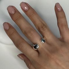 Versatility at its finest. Meet our Square Bubble Ring. She has a unique silhouette and can be worn in multiple ways! This ring has bubble-like features and can be worn on any side you prefer. Plus, it's an adjustable ring for that perfect fit! It's completely stackable but also great solo for an elegant touch. Material: 925 Sterling Silver Ring Size: Adjustable (Fits most sizes 5-9) Comes in a gift box with a microfiber bag. All of our jewelry is hypoallergenic. For more details on material and Modern Adjustable Hypoallergenic Stackable Rings, Modern Adjustable Dome Ring For Everyday, Adjustable Gold Midi Rings For Anniversary, Adjustable Open Dome Ring For Everyday Wear, Adjustable Open Dome Ring For Everyday, Adjustable Modern Midi Rings For Anniversary, Adjustable Bypass Ring With Modern Twist, Modern Twist Adjustable Bypass Ring, Modern Adjustable Stackable Rings With Open Band