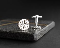 "Monogrammed Cufflinks , Boyfriend Husband Gift Metal Monogram Personalized Cuff Links, Groomsmen Gift, Wedding Gift for Him ✦ Jewelry Details ✦ * Material: 925 Sterling Silver * Finish: Silver, Gold, Rose Gold * Production Method : Handmade * Customization : This product can be your wishes name, text, letters, number or any other things. ✦ Shipping Details ✦ * Standard Shipping * Processing time: 2-4 business days * Delivering time: 2-5 business days * Express Shipping Time : 1-3 business days. Silver Cufflinks With Engraving Option For Gift, Silver Engraved Cufflinks For Father's Day, Silver Cufflinks With Engraving Option For Father's Day, Adjustable Silver Cufflinks For Personalized Gift, Silver Cufflinks With Initials As A Gift, Engraved Silver Cufflinks For Anniversary, Silver Cufflinks With Engraving Option For Wedding Gift, Classic Silver Cufflinks With Initials, Classic Sterling Silver Cufflinks For Wedding