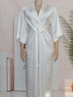 Product DetailsMaterial: 70%-80%DacronPattern Type:PrintNeckline: V-neckSleeves Type: Long SleeveDetails: PrintedStyle: CasualSlim Type: Regular FitBelt: NoWaist Line: High WaistSheer: NoBottom Type: Wide Leg Elegant V-neck Jumpsuits And Rompers For Daywear, White Stretch V-neck Jumpsuits And Rompers, White V-neck Jumpsuits And Rompers For Brunch, White V-neck Jumpsuit With Tie Waist, White V-neck Jumpsuits And Rompers For Daywear, White V-neck Jumpsuits For Daywear, African Jumpsuit, Jumpsuit V Neck, White Wide Leg Pants