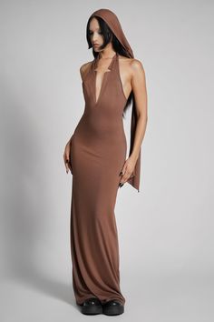 Make them take a second glance. Maxi dress made from luxuriously dense Jersey, featuring an add-on hood that can be draped across the shoulders and over the crown of the head, with plunging halter top neckline. FIT NOTES:Tatianna wears a size Small, 5'9, with a 26" waist.MATERIALS:95% rayon 5% spandexMade in China Top Neckline, The Crown, Halter Top, Dress Making, Take That, Crown, Maxi Dress, Ships, China