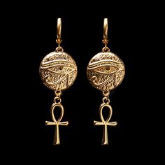 "Treat yourself or a loved one to these beautifully made earrings. The earrings are 1 3/8\" long (4.4cm). They are made of 24K gold plated brass and are expensive-looking. Choose the earrings quantity (single - 1 earring or a pair - 2 earrings) from the drop-down menu when you add items to the cart. For more of the Egypt theme jewelry: https://www.etsy.com/ca/shop/LeafOnWaterStudio?search_query=Egypt  You will receive your earrings carefully packed and ready to gift. I will include a message by request  ★ See all of our items at https://www.etsy.com/ca/shop/LeafOnWaterStudio ★ The sold jewelry is not made of solid gold and is only gold plated. To extend the life of your jewelry please keep it away from water and chemicals ★" Egyptian Style Jewelry, Symbolic Drop Earrings, Symbolic Nickel-free Teardrop Jewelry, Symbolic Dangle Jewelry With Ear Wire, Symbolic Pierced Dangle Jewelry, Symbolic Drop Earrings With Ear Wire, Symbolic Teardrop Earrings, Spiritual Metal Drop Earrings, Symbolic Single Metal Earring