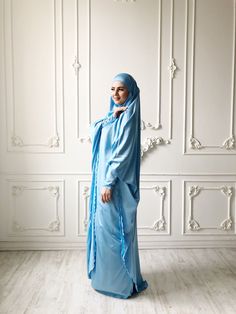 Tender light sky blue silk long khimar with high cuffs. This jilbab will be a good cover for you. Delicate fine silk ideal for summer weather. Always keep in mind that the fabric is enlightened, at the bottom have to be the dress. An elegant way for the believing women. Buttons secure the cuffs. Be sure when ordering in the note write the length of the khimar and the girth of the wrist.We can sew khimar in any other color! This handy headdress like those who do not yet know how to wind a scarf, Hijab Engagement, Wedding Abaya, Sports Hijab, Bohemian Headband, Dubai Abaya, Instant Hijab, Beautiful Prayers, Muslim Dress, Engagement Outfits