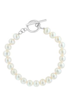 Accessorize with the timeless sophistication of this single-strand bracelet showcasing lustrous freshwater pearls. 7 1/2" inner circumference Pearl size: 7–7.5mm Sterling silver/freshwater pearl Made in the USA Single Strand Pearl Bracelet, Classic Adjustable Pearl Bracelet With Sterling Silver Clasp, Classic Pearl Bracelet With Round Beads, Formal Pearl Bracelet With Sterling Silver Clasp, Elegant Pearl Bracelets With Sterling Silver Clasp, Classic Silver Pearl Chain Bracelet, Classic Pearl Jubilee Bracelet, Timeless Round Pearl Bracelet, Classic Beaded Bracelets With Sterling Silver Clasp