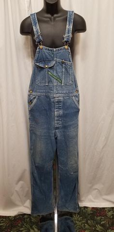 Vintage 1980s-90s Key Imperial Aristocrat of Overalls Stonewashed Overalls Denim Bib Carpenter Dungarees, Workwear, Farm.  Gloriously worn in vintage condition - see pics! Overalls have a front 2 button closure, 2 deep side pockets, and 2 back pockets.  Shoulder straps are adjustable! Measurements: shoulder to shoulder 11 in, shoulder to bottom length 68, inseam 32, length from shoulder to crotch 36, top of bib 8 1/2 across, waist 34 inches. Vintage Washed Cotton Overalls, Vintage Denim Blue Overalls With Pockets, Vintage Denim Blue Overalls, Retro Medium Wash Cotton Overalls, Vintage Medium Wash Washed Overalls, Vintage Blue Cotton Shortalls, Vintage Medium Wash Overalls With Pockets, Vintage Medium Wash Overalls, Vintage Dark Wash Overalls