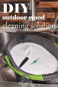 an outdoor wood cleaning solution in a sink with the words diy on it and above it