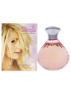 Paris Hilton's Electrify Eau De Parfum captures a dynamic persona with its rich, floral composition. The opening notes of red apple and fresh ozonic accords provide an invigorating start that awakens the senses.The heart flourishes with blends of peony, Turkish rose, and magnolia, wrapping the wearer in a hypnotizing aura. It concludes with cozy notes of vanilla absolute, coconut, and sandalwood, leaving an unforgettable impression of elegance and joy. Embrace this fusion for a truly captivating Calypso Orchid, Floral Composition, Fruity Fragrance, Paris Hilton, Perfume Spray, Red Apple, Kids Beachwear, Design House, Socks Women