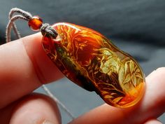 Hello, my dear friend!) Welcome to our store! Here are the products of one very talented craftsman with more than 25 years of experience working with amber!  He makes all the images by hand according to his sketches!  An intaglio is a reverse engraving on a stone.  In this case it is natural amber.  The master tries to find harmony between the design and the natural elements of the stone.  Air bubbles (clouds), stone crust or small inclusions.  Ask any questions, I'm always here!) I hope you find something of your own here!  Come in and have fun! weight: 3.23 g height: 1.76 inc width: 0.9 inc Amber Pendant, My Dear Friend, Natural Amber, Natural Elements, Air Bubbles, The Master, Dear Friend, 25 Years, Pendant Necklaces