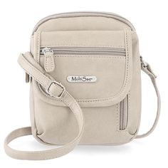 Carry your essentials with ease in this MultiSac crossbody bag. Carry your essentials with ease in this MultiSac crossbody bag. HANDBAG FEATURES Fits a smart phone Silver-tone hardwareHANDBAG DETAILS 6"H x 7.125"W x 1.25"D 26" adjustable crossbody strap Zipper closure Interior: 3 card slots Exterior: 2 zip pockets, 1 slip pocketCONSTRUCTION & CARE PVC Polyester lining Machine wash Imported Size: One Size. Color: White. Gender: female. Age Group: adult. Daily Use Crossbody Phone Bag With Anti-theft Pocket, Anti-theft Crossbody Phone Bag, Accessories Guide, Womens Leather Belt, Convertible Crossbody Bag, Large Crossbody Bags, Faux Leather Backpack, Mini Crossbody Bag, Mini Crossbody