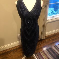 Gorgeous Navy Sequin Dress With V-Neck, Hidden Zipper And Fully Lined. Classic Nicole Miller Sophistication With A Timeless Elegance. Length 40.5- Approximately Waist 16.5- With Some Stretch It Can Be Spot Cleaned Or Hand Washed. Smoke Free Home Never Worn - Brand New Box 1, Number 20 Navy Sequin Dress, 1 Number, Size 12 Dress, Nicole Miller, Sequin Dress, Hidden Zipper, Timeless Elegance, Dresser, Colorful Dresses