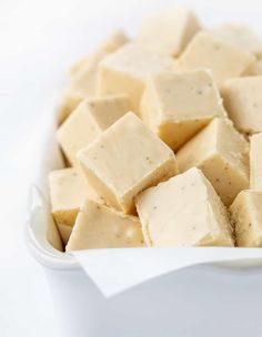 a white bowl filled with tofu and sauce