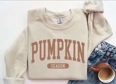 This is a comfy and cute retro fall t-shirt, perfect for the fall and makes a great gift! Color may vary based on photo and computer screens || DETAILS || + Comfort Color t-shirt or sweatshirt + Size up for an oversized fit! + Super comfy! + Includes one t-shirt  || SHIPPING || + All orders are shipped via USPS  +Turn around time is 3 - 5  business days + shipping time || WASHING || + Wash cold inside out + Air dry or low heat tumble || DISCLAIMER || + You may not sell, alter, or redistribute th Fall Sweaters Vinyl, Pumpkin Sweater, Varsity Sweatshirt, Gift Ideas For Her, Pumpkin Season, Pumpkin Seasoning, Retro T Shirt, Fall Shirt, Cute Pumpkin