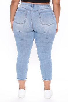 Available In Light Blue Wash High Rise Stretch Denim 5 Pockets Fray Hem 26" Inseam Disclaimer: Due To The Specialized Wash Process. Each Item Is Unique. 64% Cotton 32% Polyester 2% Rayon 2% Spandex Imported Stretch Medium Wash Jeggings With Frayed Hem, Light Wash Stretch Denim Jeggings, Non-stretch Mid-rise Blue Cropped Jeans, Denim Blue Stretch Cropped Jeans, Medium Wash Cropped Leg Denim Jeggings, Medium Wash Cropped Denim Jeggings, Blue Mid-rise Denim Jeggings, Spring Medium Wash Cropped Jeggings, Spring Cropped Leg Medium Wash Jeggings