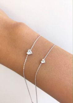 Sweet and simple with an extra special bit of love. Small solitaire heart is .21 ctw Large solitaire heart is .46 ctw Mother Daughter Jewelry, Zircon Bracelet, Bangle Ring, Jewelry Bracelets Gold, Jewelry Accessories Ideas, Heart Chain, White Gold Jewelry, Heart On, Diamond Sizes