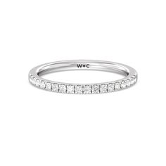 a white gold wedding band with diamonds