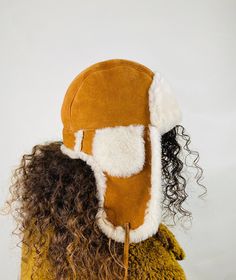 Our aviator hats are made of first quality sheepskin and fur. It is suitable for every style of dressing. Hats have a leather strap that snaps ear flaps under your chin. All of our products are handmade  Gloves that you can combine in similar styles are available on our page. Please contact us if you have any questions. Brown Aviator Winter Hats, Winter Brown Aviator Hats, Brown Winter Hats, Sheepskin Hats With Ear Flaps For Outdoor, Sheepskin Outdoor Hat With Ear Flaps, Brown Sheepskin Hat With Faux Fur Lining, Sheepskin Hat With Faux Fur Lining And Ear Flaps, Brown Hat With Faux Fur Lining And Ear Flaps, Winter Sheepskin Hats With Plush Lining