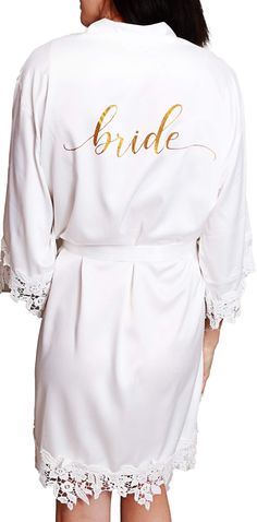 the bride robe is white with gold lettering