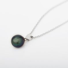 "This necklace is a very elegant and tasteful addition to any wardrobe. The pendant features a beautiful and rare Tahitian pearl, a timeless gemstone. ●Tahitian Pearl ●Birthstone for June ●14k White Gold Pendant ●14k White Gold 18\" Curb Chain" Pearl Birthstone, Tahitian Pearl Necklace, White Gold Pendant, Jewelry Studio, Wedding Jewellery Necklace, Tahitian Pearls, Curb Chain, Tahiti, Wedding Necklace