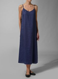 Timeless and true - make a lasting impression with this standout feminine dress. Just sit back, relax, and let the dress do the talking when you slip into this simple detailed dress. Casual Tie Back Midi Length Slip Dress, Tie Back Midi Length Slip Dress For Casual Wear, Elegant Unlined Slip Dress For Summer, Elegant Unlined Summer Slip Dress, Elegant Beach Slip Dress With Tie Back, Adjustable Straps Midi Dress For Daywear, Chic Long Dresses With Adjustable Straps, Elegant Beach Slip Dress With Adjustable Straps, Elegant Tie Back Slip Dress For Beach