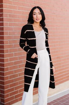 Update your cold-weather uniform with the Matilda. This striped, knee-length cardigan pairs perfectly with your favorite jeans and ankle boots (or leggings and slippers, if you want to up the cozy factor). Details: Small: 36” bust, 36” waist, 37.5” length, 19.5” sleeve length Medium: 40” bust, 39” waist, 37.5” length, Cardigan Outfit, Cardigan Outfits, Striped Cardigan