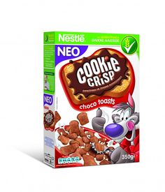 a box of cookies with chocolate toppings on the front and side, sitting on a white surface