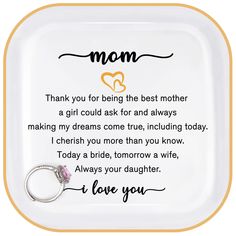 a mother's poem on a tray with a ring