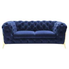 a blue velvet chesterfield style sofa with gold legs and tufted back, viewed from the front